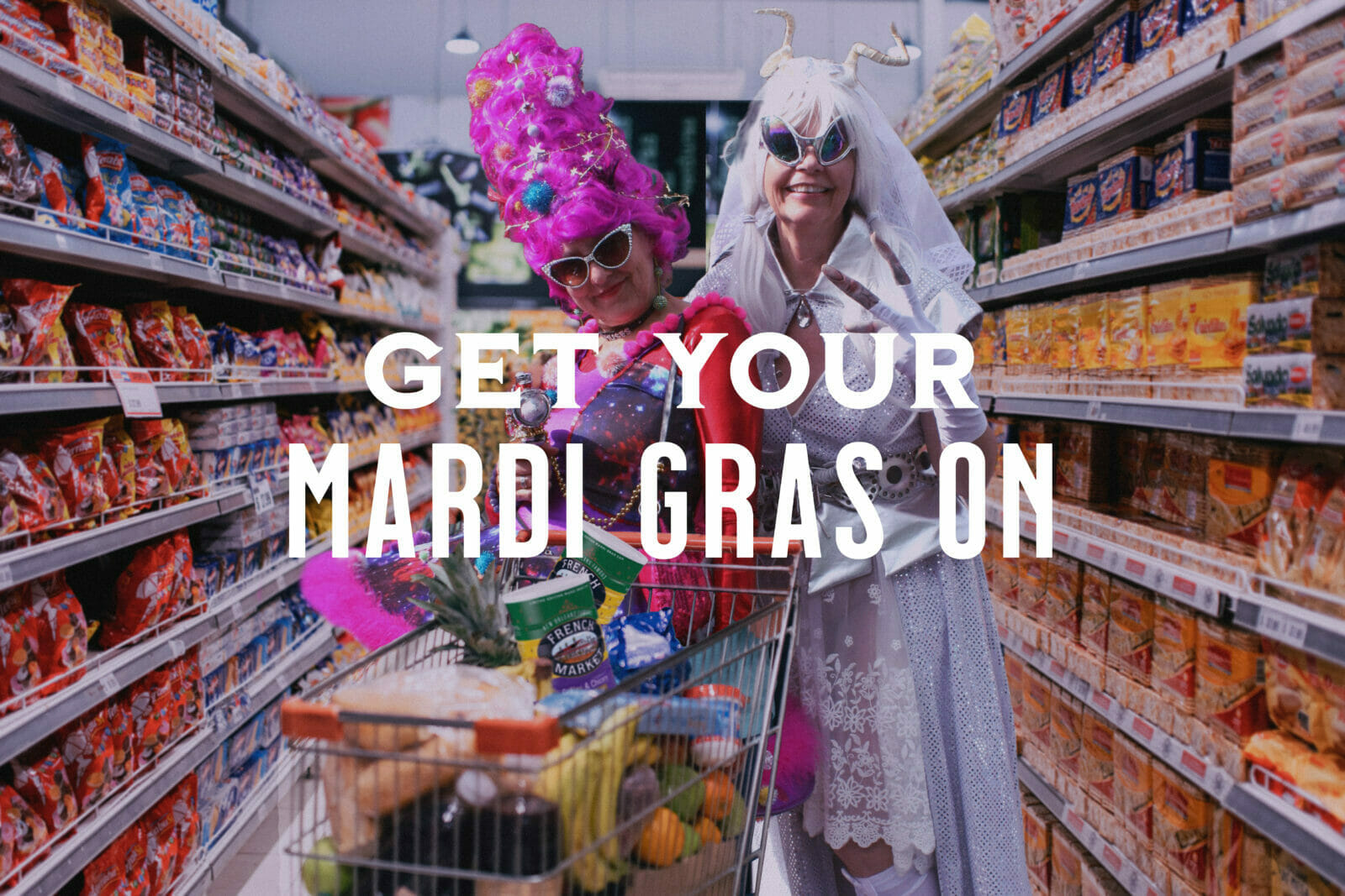 Mardi gras revelers shopping in the coffee isle for French Market Coffee.